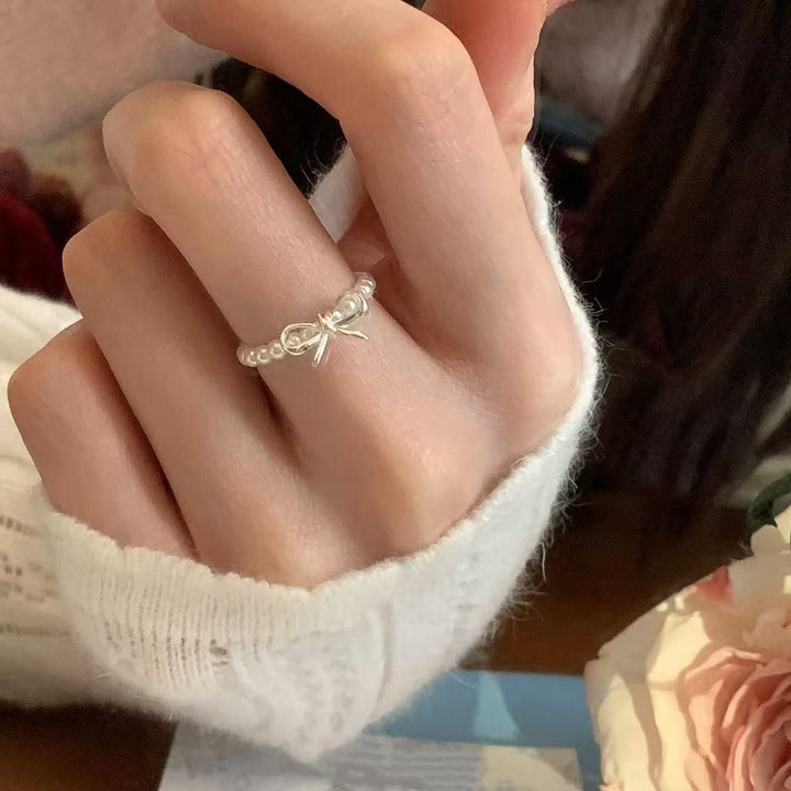 Women's Adjustable  Bow Pearl Elastic Ring