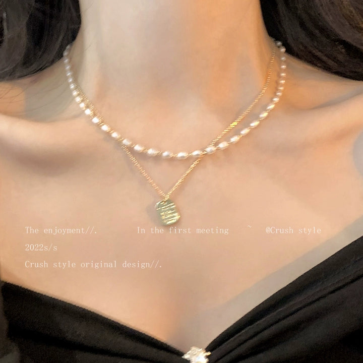 Gold pearl necklace women's spring sense of luxury, light luxury, niche necklace accessories, double layered personality clavicle chain