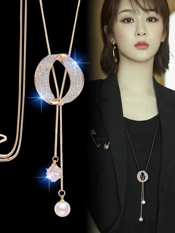 Long Light Luxury Tassel Freshwater Pearl Necklace – Golden Non-Fading, High-End Niche Design for Women