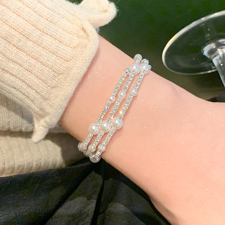 Multi-layered wraparound pearl bracelets, women's silver ring bracelets, bracelets, light luxury, niche zircon bracelets, elastic jewelry